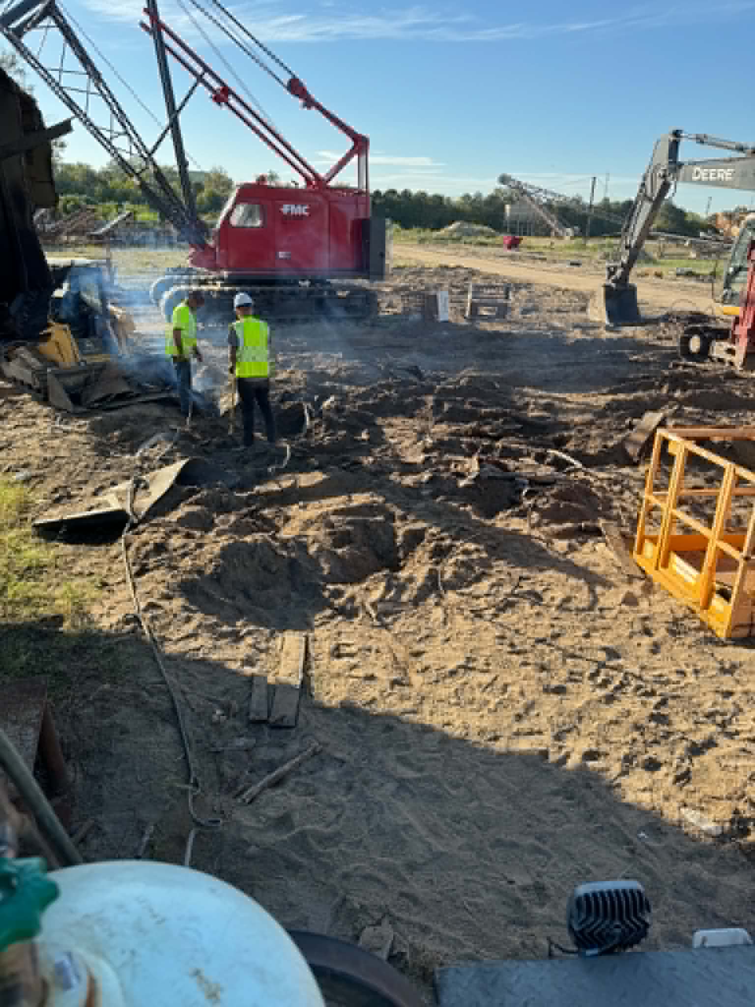 Crane and crew on a structural demolition project — crane rigging capability used on bridge and infrastructure removal